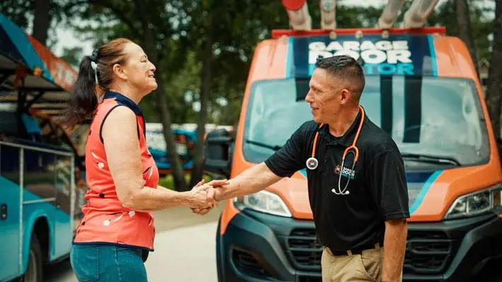 shaking happy customers hand